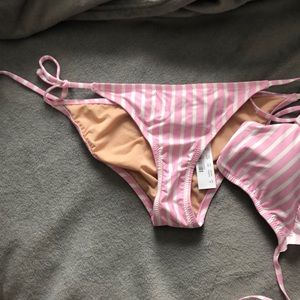 Stripped cross around bathing suit